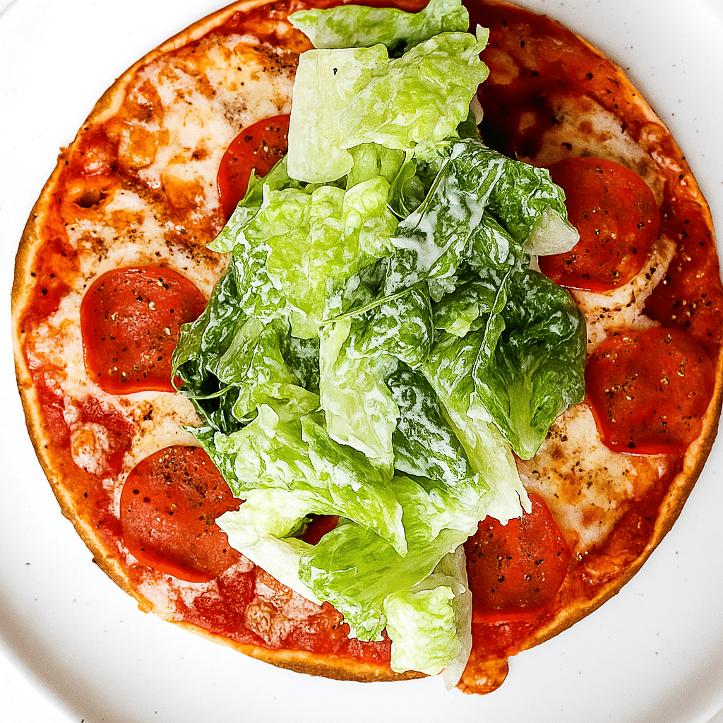 Caesar salad topping on pizza wrap