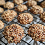 Seedy quinoa breakfast cookies cooling on rack