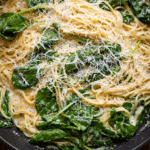 Creamy Fresh Spinach & Lemon Spaghetti with garlic, parmesan, and lemon zest on top