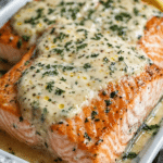 Easy Baked Boursin Salmon topped with creamy garlic herb sauce