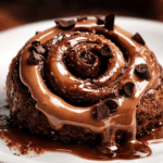 Homemade easy chocolate cinnamon rolls topped with sweet glaze and chocolate chips