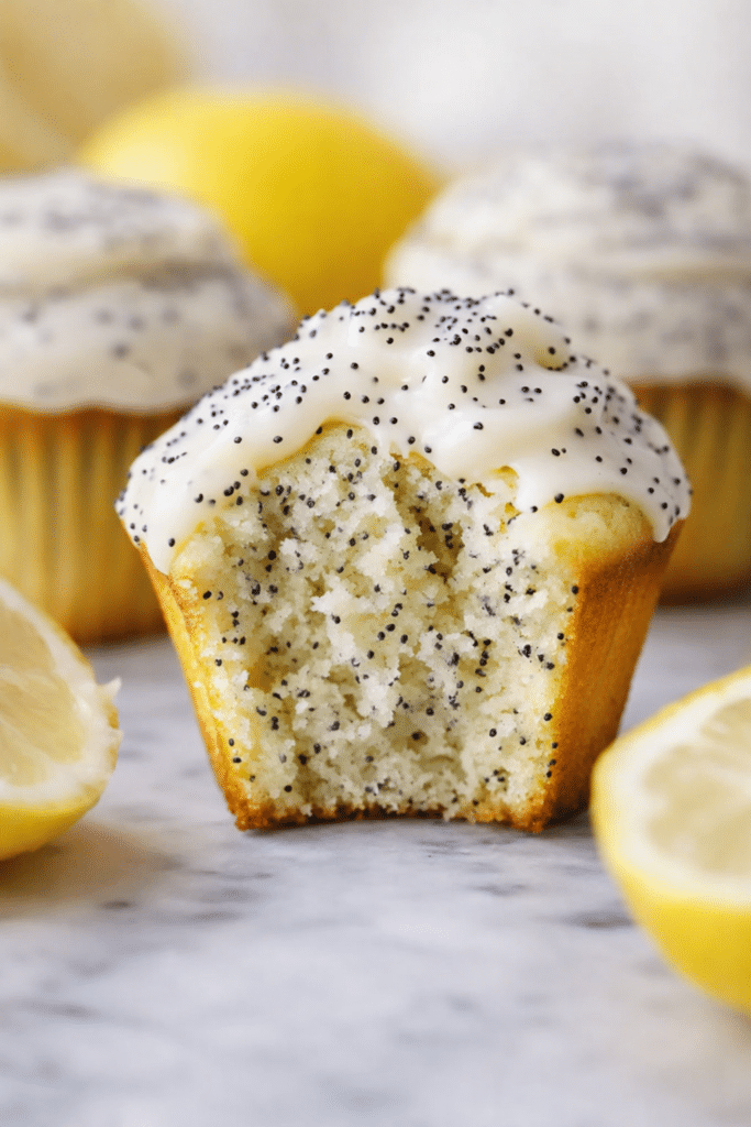 Homemade lemon poppy seed muffins with fresh lemon glaze and fluffy texture